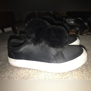 Woman’s Pom Pom slip on shoes